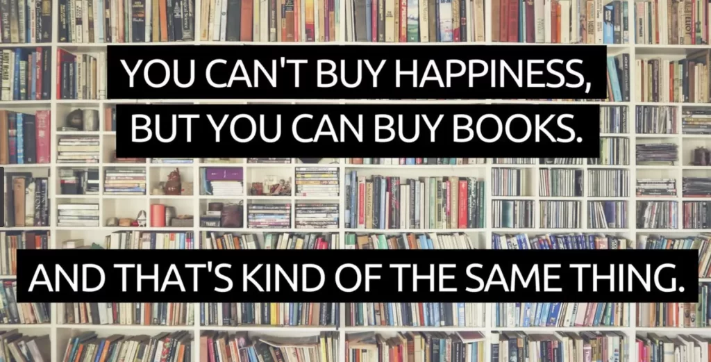 Kuva kirjahyllystä. Teksti: You can't buy happiness but you can buy books. And that's kind of the same thing.
